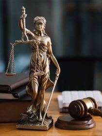 statue-of-lady-justice-on-desk-of-a-judge-or-lawye-SVECXT5-intro.jpg